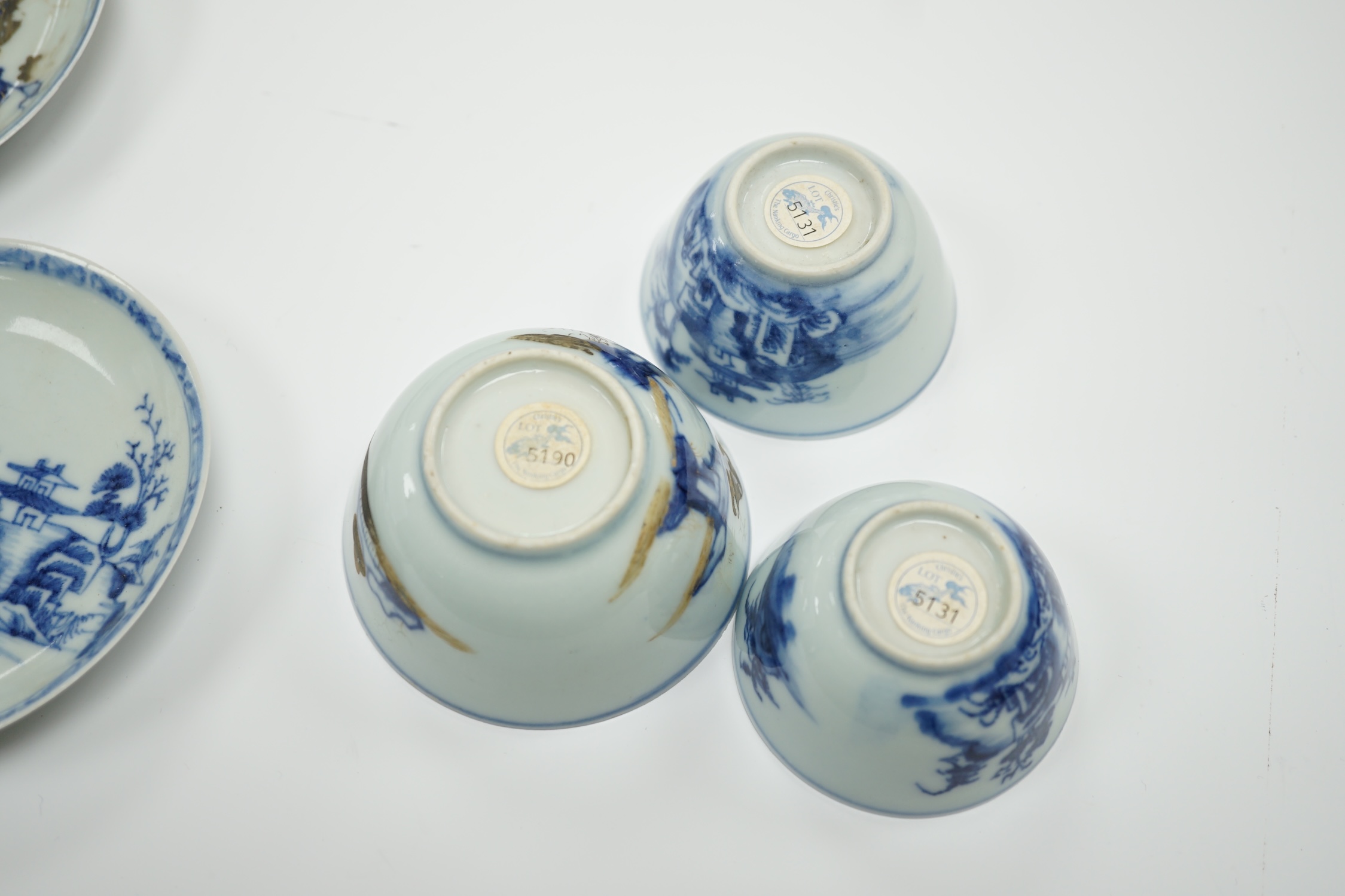 Three Chinese blue and white Nanking Cargo teabowls and saucers, largest 11.5cm diameter